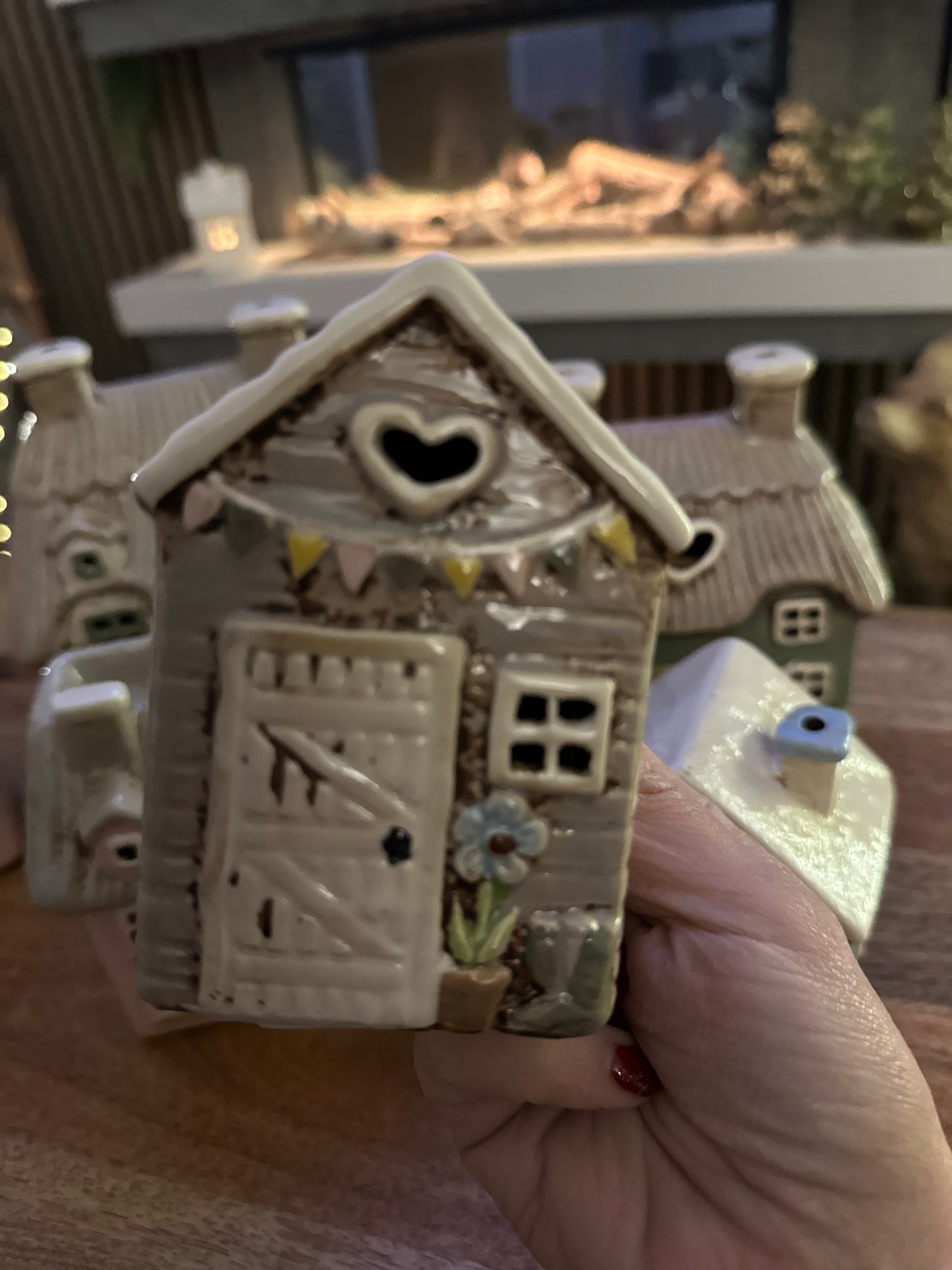 Stonewear Garden Shed with embossed blue flower Tea Light Holder