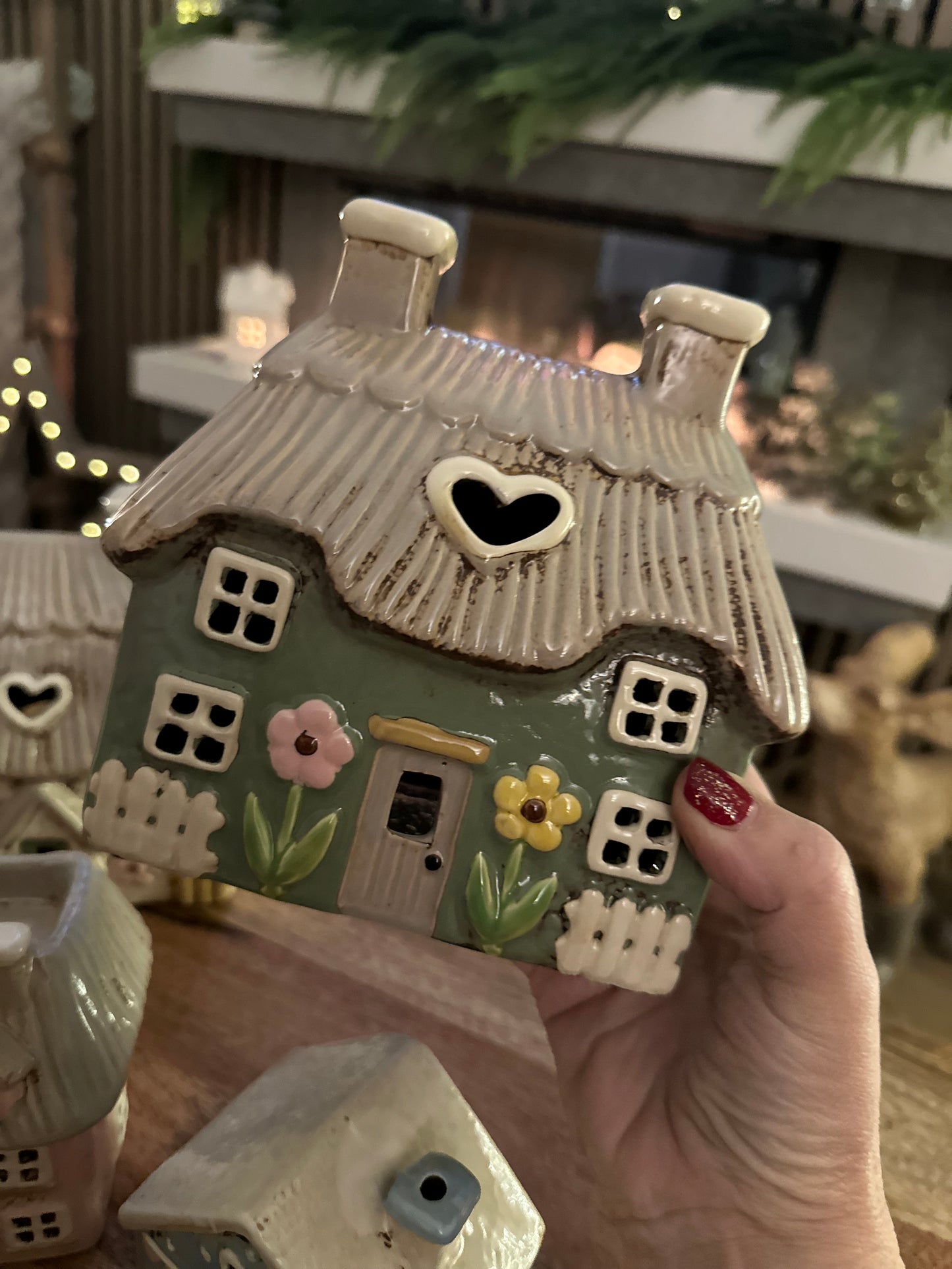 Green Thatched Stonewear Cottage with embossed Flowers Tealight Holder